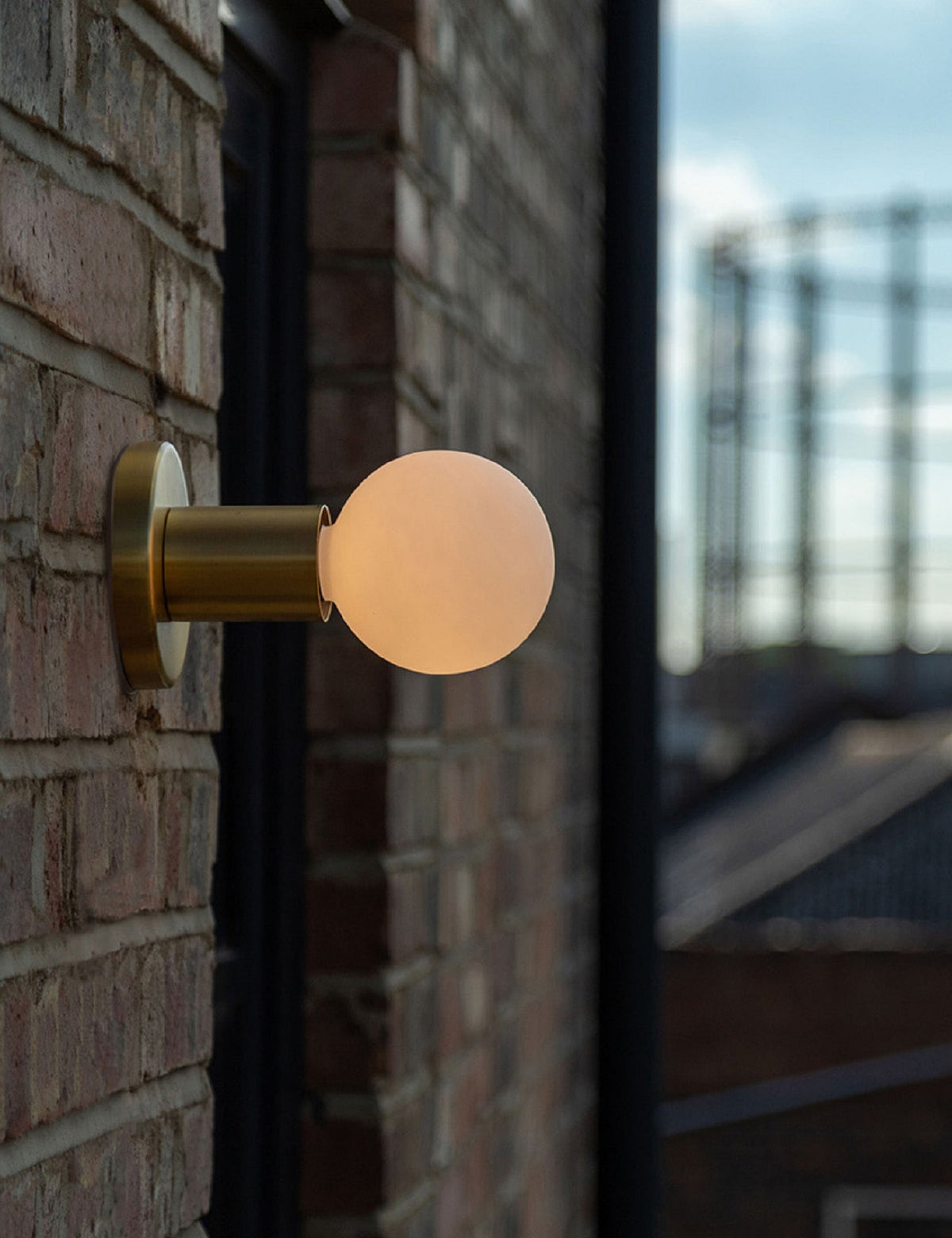 Lochan Outdoor Sconce with Sphere III - Wall Sconce Lighting in a room